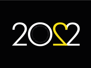 Etichetta per bottiglie di vino con sfondo nero e scritta "2022" in bianco. La terza cifra, il secondo due è in giallo e girato allo specchio in modo da formare con l'ultimo due un cuore.